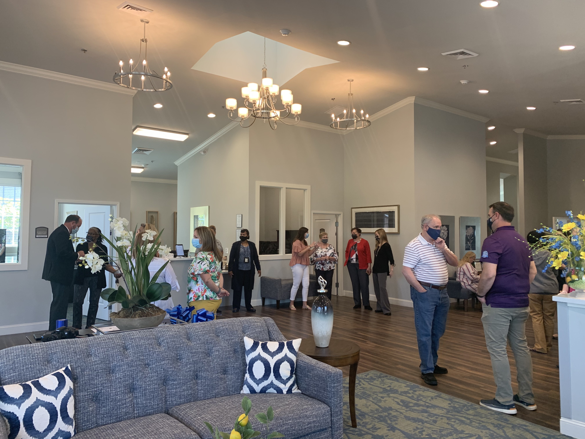 Ribbon Cutting Event, inside building